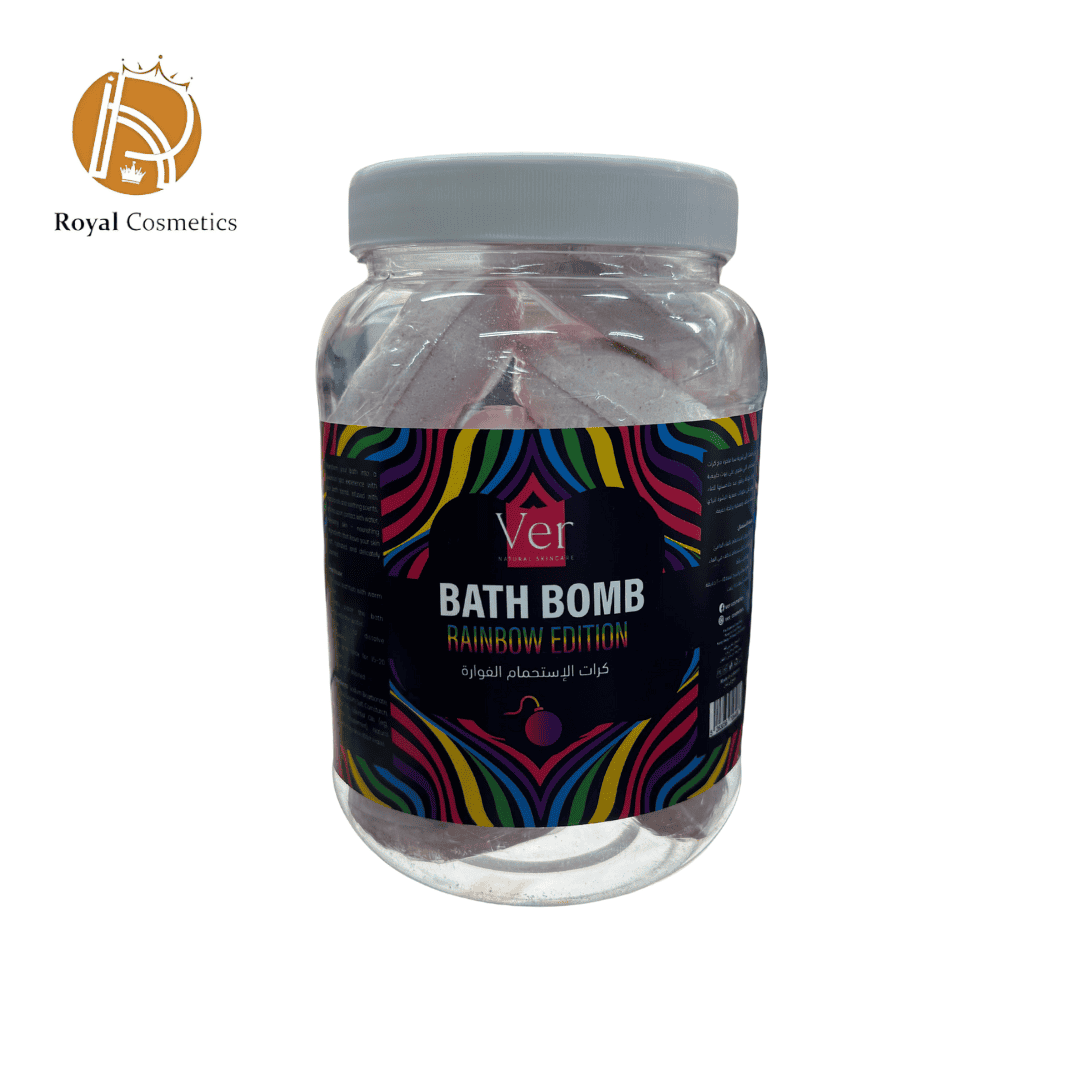 VER Rainbow Bath Bomb exploding with multicolor swirls in water, infused with coconut oil and lavender essential oil for skin hydration and aromatherapy